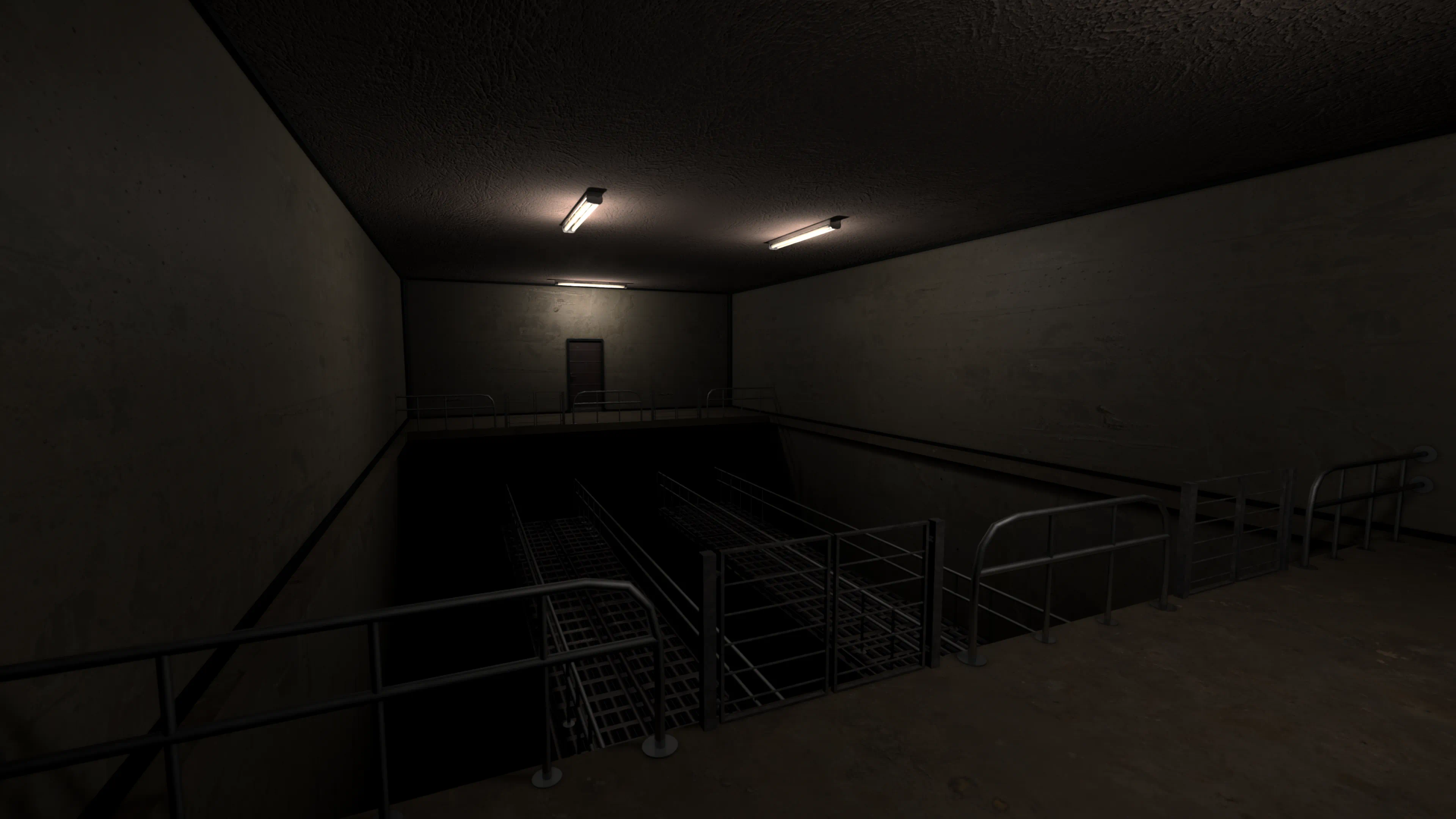A dark industrial level of the facility, steel walkways and railings above an unlit lower floor